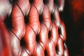 Detail of the background of the leather of a red armchair Royalty Free Stock Photo