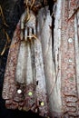 Detail of balinese wooden sculpture, hand and skirt Royalty Free Stock Photo