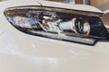 Detail of a beauty and fast car with headlight. Royalty Free Stock Photo