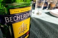 Detail of Becherovka alcohol bottle on a party table