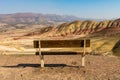 Detail of a bench facing the colorful landscape in Painted Hills Overlook