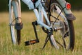 Detail of bicycle closeup on grass field Royalty Free Stock Photo