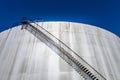 Detail of a big abandoned oil refinery gas tank Royalty Free Stock Photo