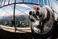 Detail of binoculars and background view of New York City from the Empire State Building. USA America, Manhattan