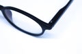 Detail of Black Eyeglasses in The White Background with Oblique Top Shot, Landscape Mode and Minimalist