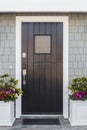 Detail of black front door to home