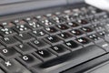 Detail of black laptop keyboard at office Royalty Free Stock Photo