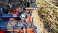 Detail of a black old steam locomotive while driving. Dynamics through motion blur Royalty Free Stock Photo