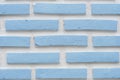 Detail of a blue brick wall texture white background Royalty Free Stock Photo