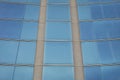 Detail of blue glass facade of a contemporary building Royalty Free Stock Photo