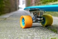 Detail of penny board in an alley