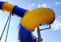 Detail of a blue and yellow water slide in an abstract style Royalty Free Stock Photo