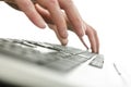 Detail of blurred male hands typing