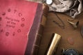 Detail book of world religions on table with decorative objects