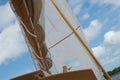 Detail of boom and sail foresail, jib on a sailing boat on a sunny day, while sailing Royalty Free Stock Photo