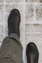 Detail of boots Walking in Fresh White Snow