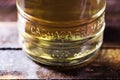 Detail of a bottle of cachaÃÂ§a, a typical Brazilian drink. Brazilian product for export, distilled drink known as aguardente or Royalty Free Stock Photo