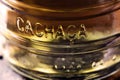 Detail of a bottle of cachaÃÂ§a, a typical Brazilian drink. Brazilian product for export, distilled drink known as aguardente or Royalty Free Stock Photo