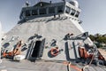 Detail of bow deck work tools in Maritime action warship