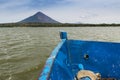 Detail of the bow of a ferry boat with the Ometepe Island on the background, in Nicaragua Royalty Free Stock Photo