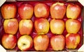 Detail of a box of excellent red apples Royalty Free Stock Photo