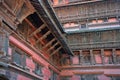 Detail of brick wall and roof of buddhist shrine in Kathmandu Royalty Free Stock Photo