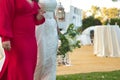 Detail of the bride's bouquet on the arm of her godmother before the wedding ceremony. Wedding concept, bouquet, flowers,