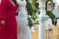 Detail of the bride's bouquet on the arm of her godmother before the wedding ceremony. Wedding concept, bouquet, flowers,