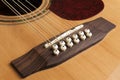 Detail of the bridge of a 12-string guitar Royalty Free Stock Photo
