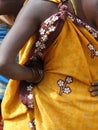 Detail, bright colored saris on tribal women