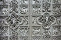 Bronze bas-reliefs of the Pieta scene in bas-relief at Milan`s Cathedral doors