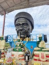 Detail of Buddha gold statues and statue of The famous monk named Luang Pu Mun in Chachoengsao at Thailand