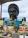 Detail of Buddha gold statues and statue of The famous monk named Luang Pu Mun in Chachoengsao at Thailand