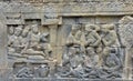 Detail of Buddhist carved relief in Borobudur temple.