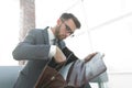 Detail of a businessman holding his briefcase Royalty Free Stock Photo