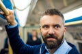 Detail of businessman travelling to work. Inside underground wag Royalty Free Stock Photo