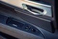 Detail of buttons controlling the windows in a car Royalty Free Stock Photo