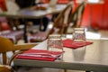 Detail of a cafeteria table with a cutlery.