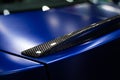 Detail of car rear spoiler carbon fiber texture finished