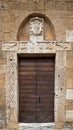 The carved stone entrance of an ancient Italian medieval church Royalty Free Stock Photo