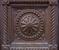 Detail, carved wooden surface of an old door, background