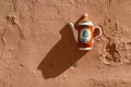 The detail of the ceramic jug walled in the wall Royalty Free Stock Photo