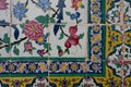 Detail of ceramic tiles with islamic floral ornaments. Floral patterns of Shia islam, Shiraz, Iran.