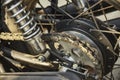 Detail of the chained transmission of a vintage motorcycle. Royalty Free Stock Photo