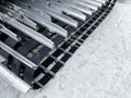 Detail of the chains of a crawler vehicle, chains of a piste machine, trail groomers, piste bashers, over the snow of a winter