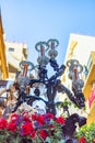 Huelva, Spain - April 14, 2022: Throne or platform Solemn of the Brotherhood of the Holy Cross in procession by the narrow streets