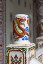 Detail of Chinese art in public shrine. Royalty Free Stock Photo