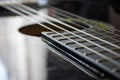 Detail of classic acoustic guitar with shallow DOF and blur.