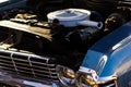 Detail of a classic american car with a hood and radiator Royalty Free Stock Photo