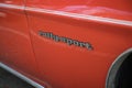 American sports car, first generation Chevrolet Camaro 350 Rally Sport in red orange color